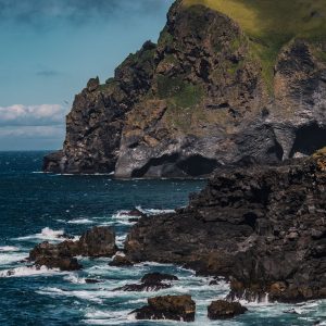 Basalt sea cliffs on the southern coast of Iceland